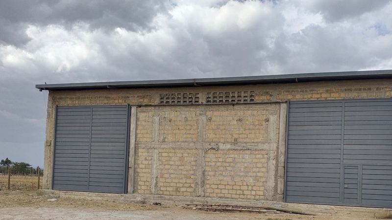 The store with its sliding doors painted grey